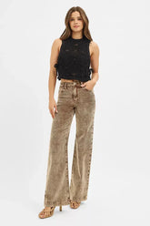 Model wearing high rise wide leg corduroy jeans by RISEN — elegant casual outfit inspiration
